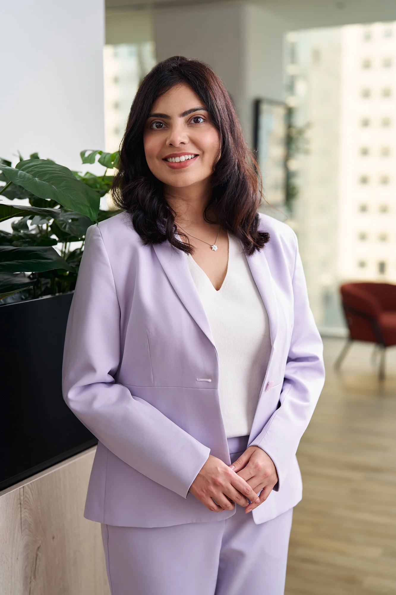 woman in purple suit