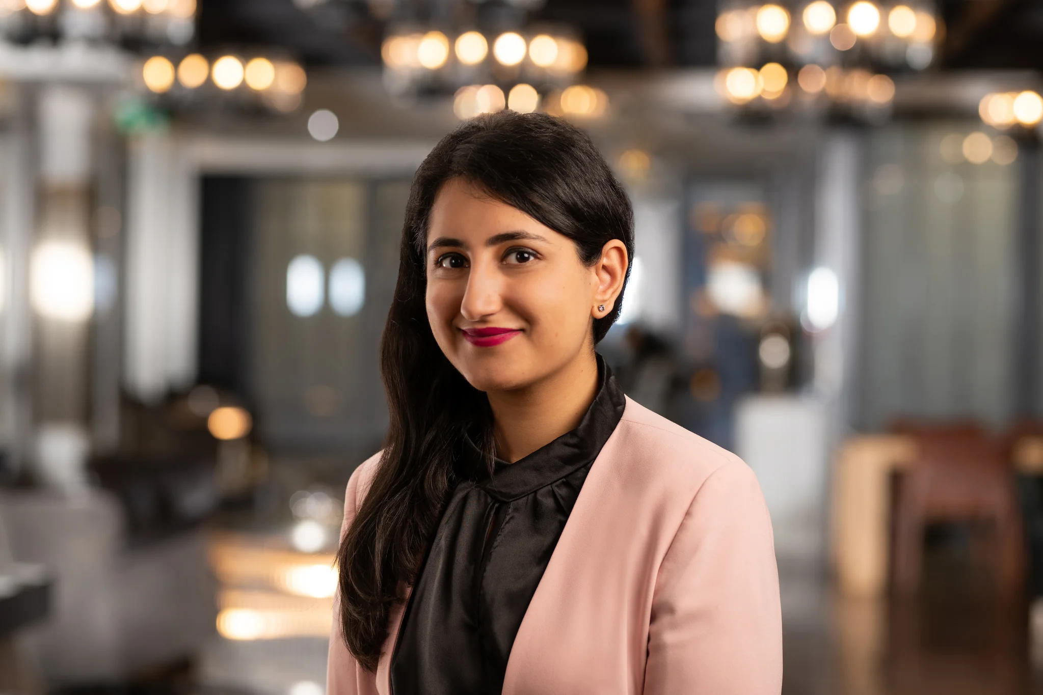 woman in purple suit