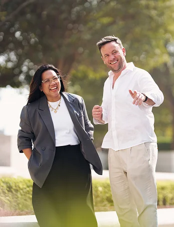 man and woman smiling