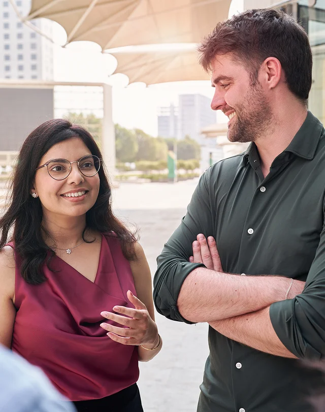 man and woman smiling