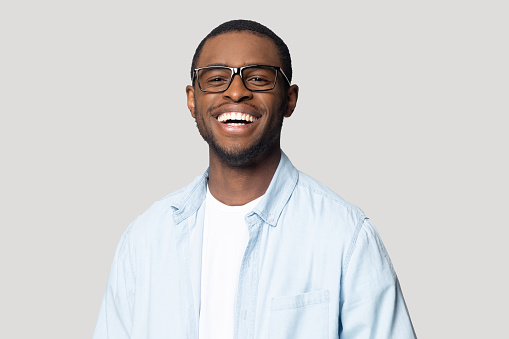 Man with glasses smiling 