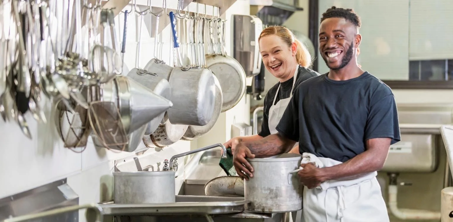 man and woman smiling