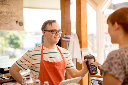 barista taking payment