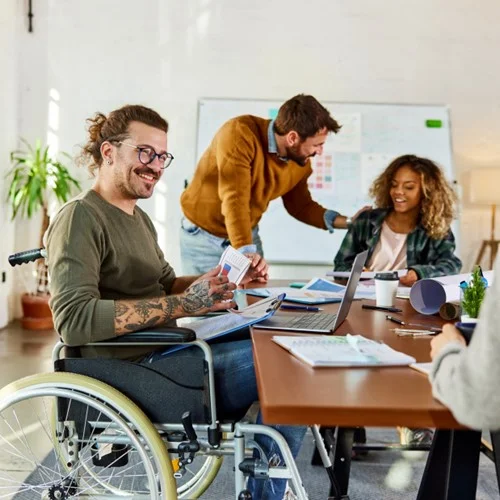 ED&I image Business person in a wheelchair working at a laptop