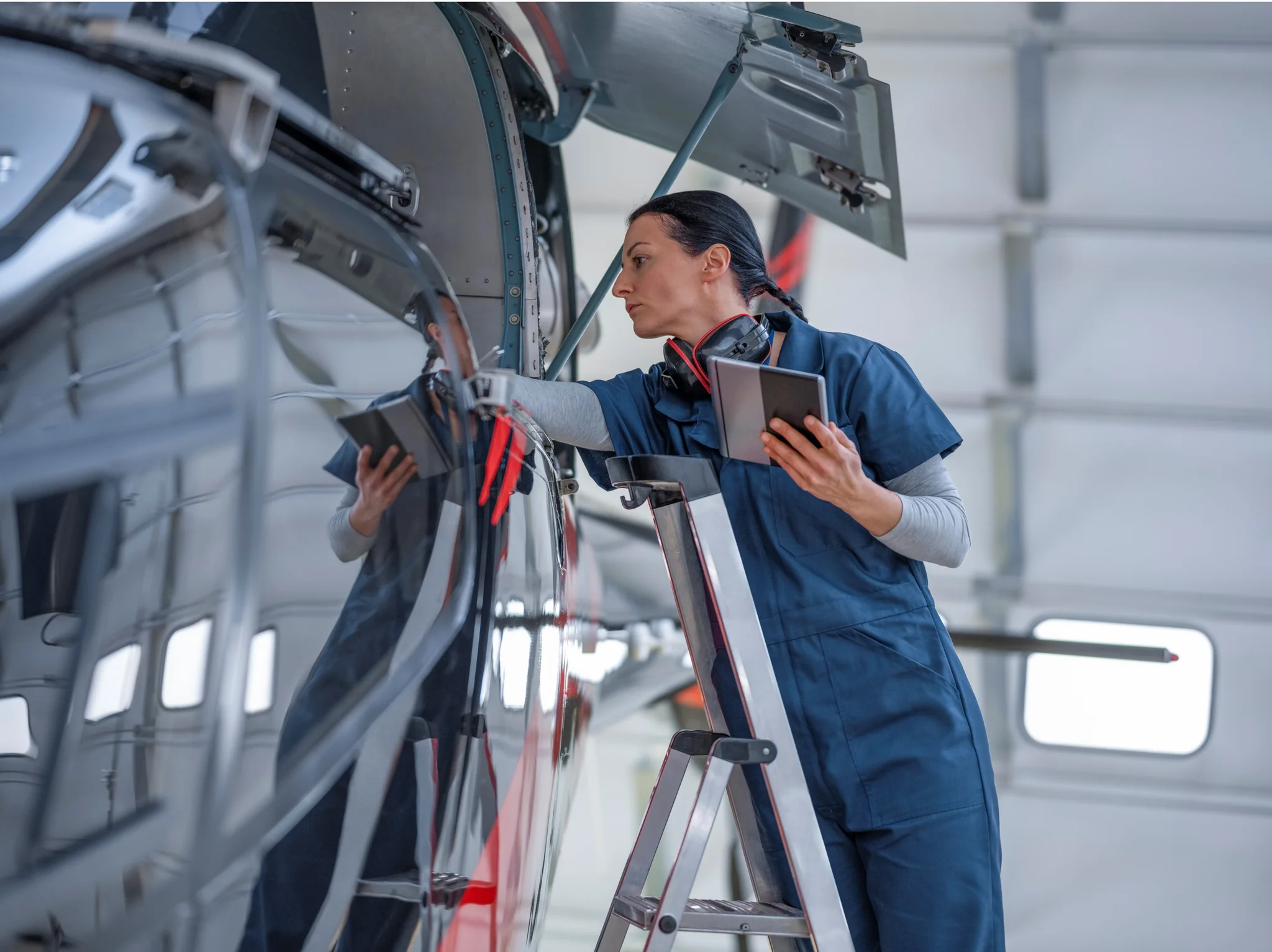 Aerospace engineer inspecting an aircraft