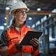 woman in hard hat in warehouse