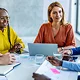 women working in office meeting
