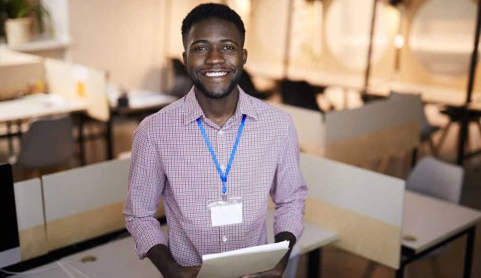 An Event Coordinator smiling at a venue 