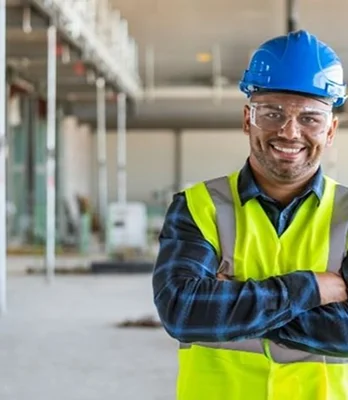 man in hard hat smiling