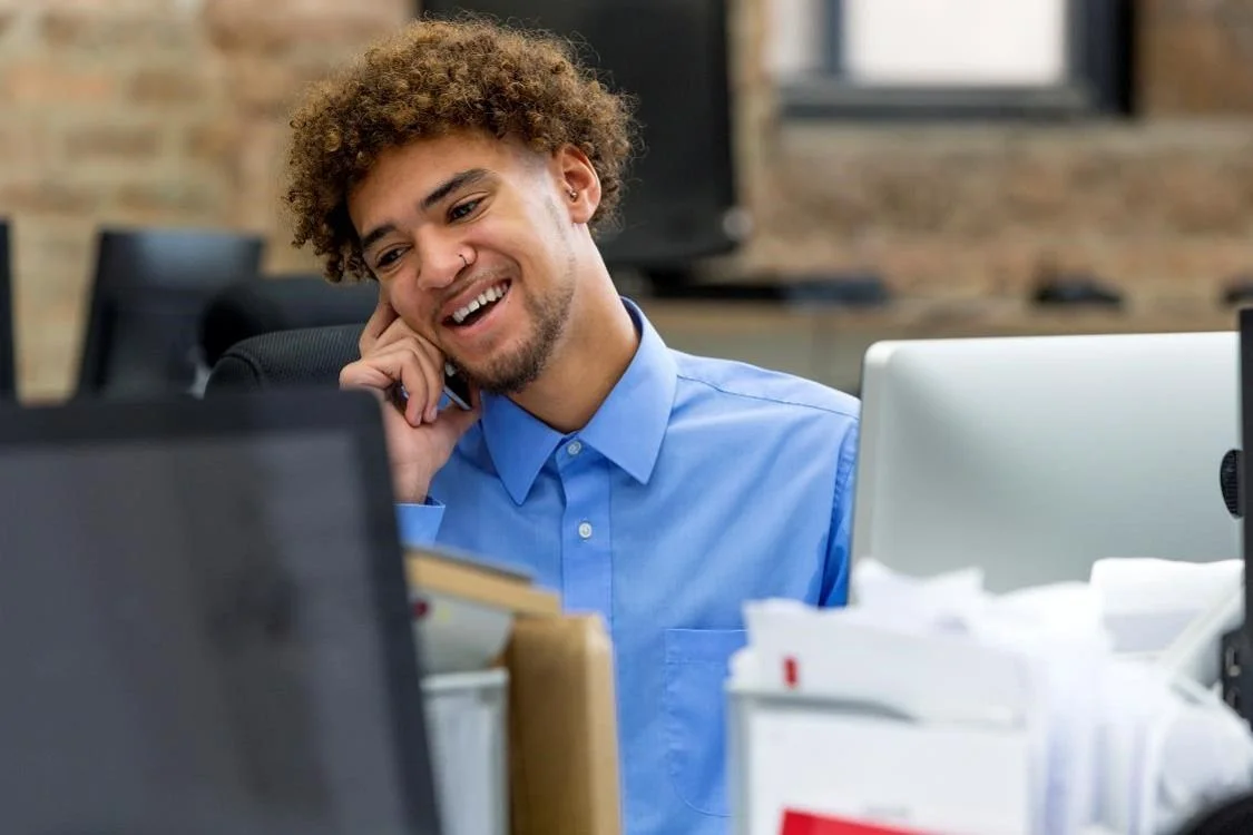 HR Assistant on a call at work
