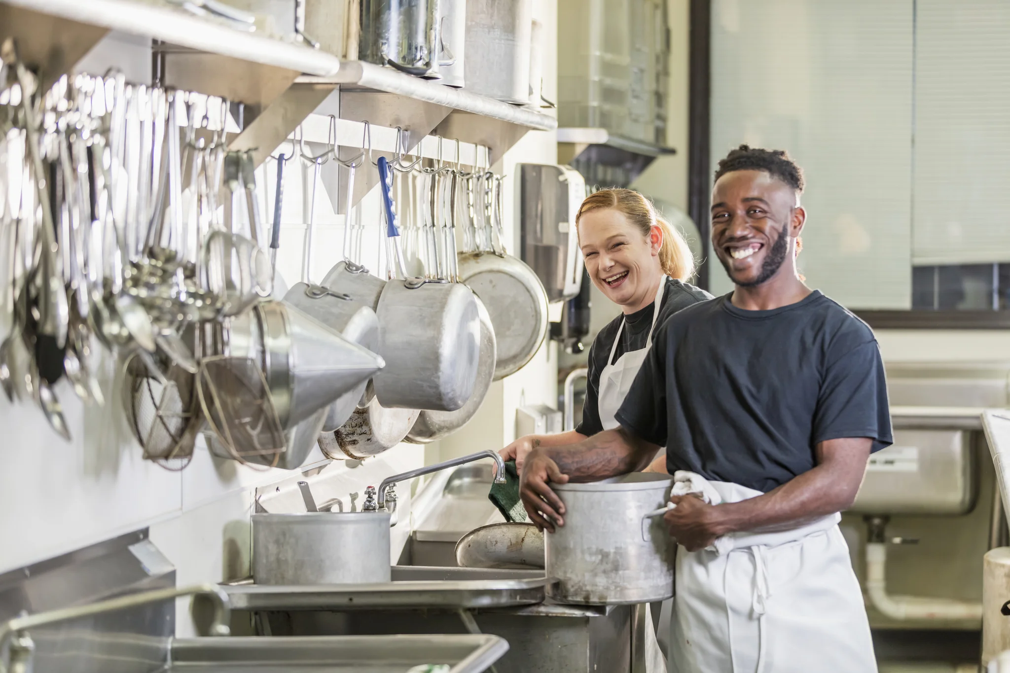How to Become a Kitchen Porter preview image people washing pots