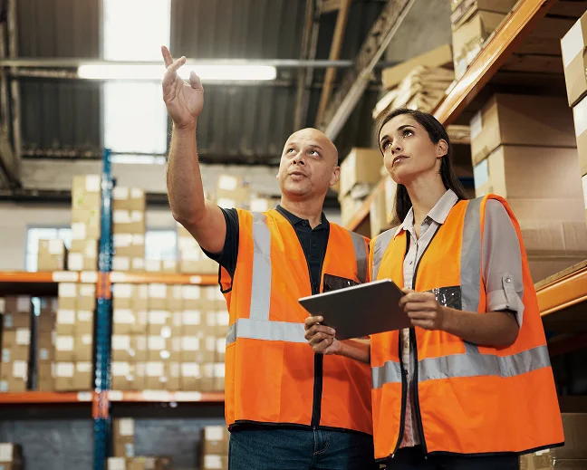people working in a warehouse