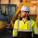 man in hi vis and hard hat outside
