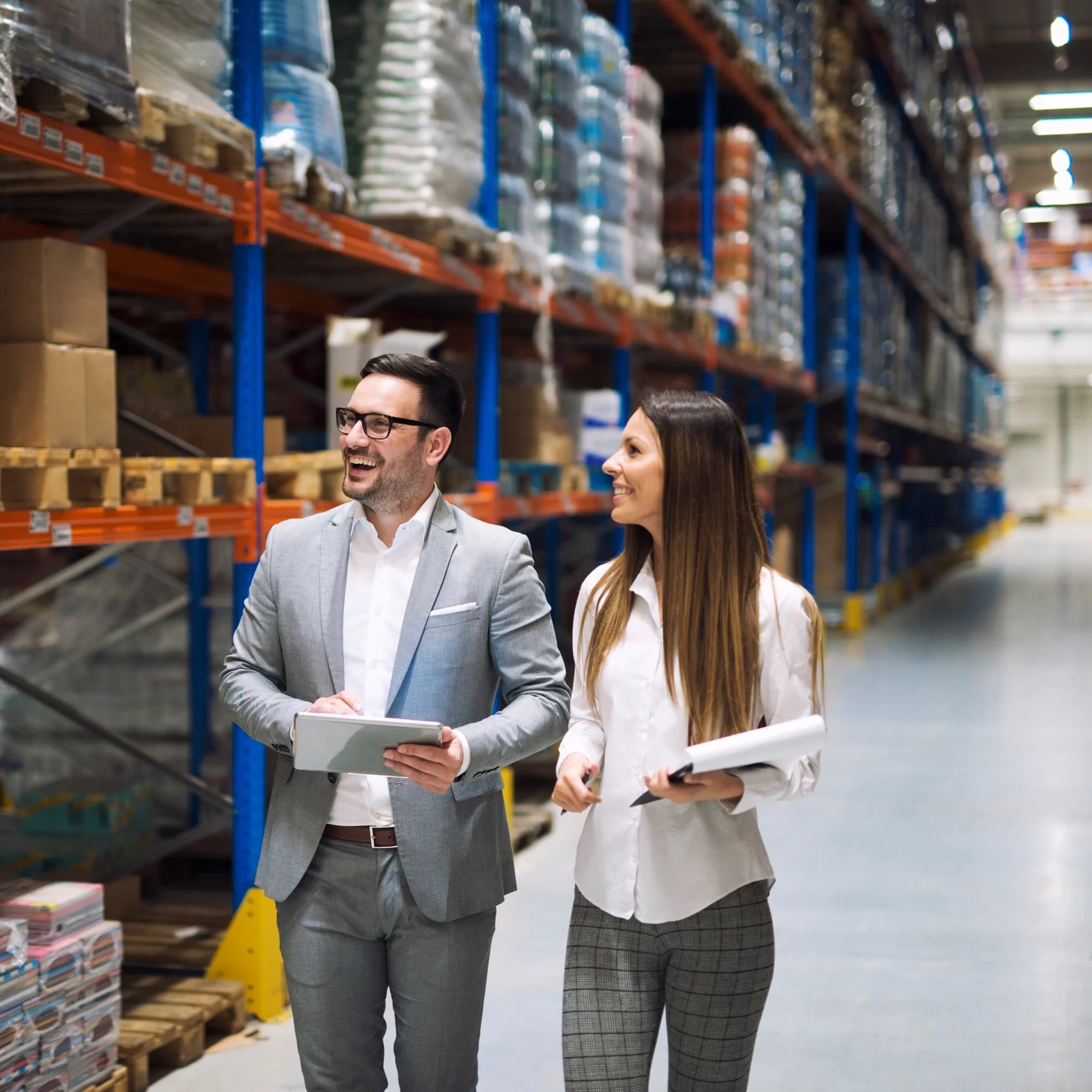 Logistics workers inspecting warehouse