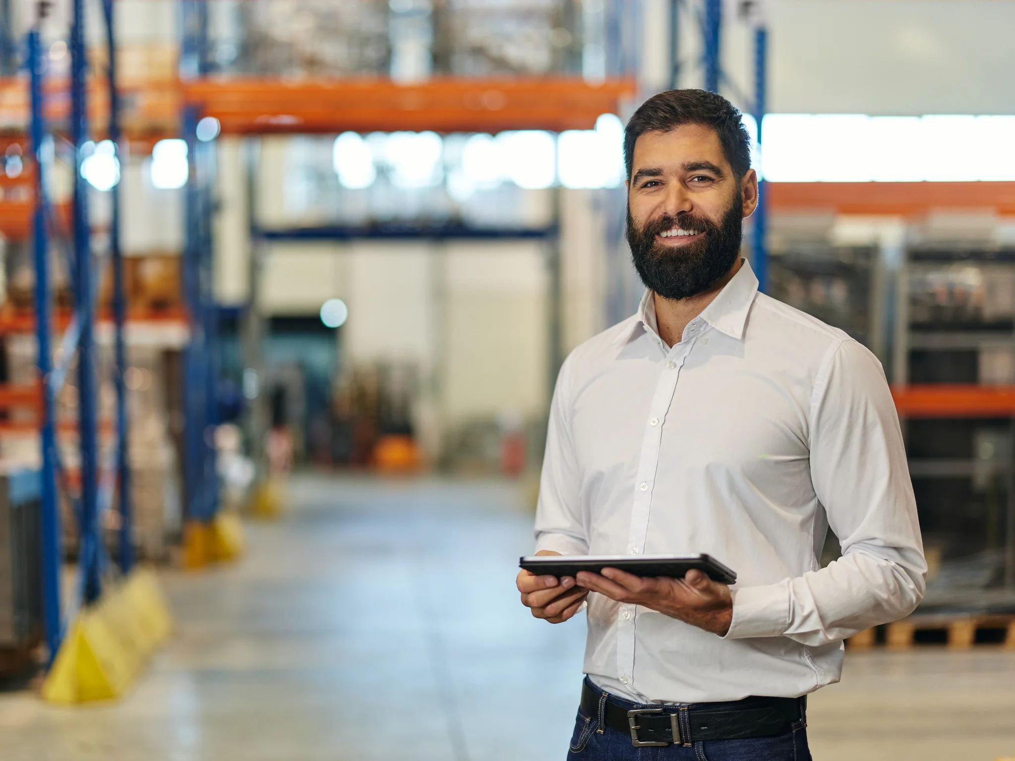 Smiling Logistics professional in a warehouse