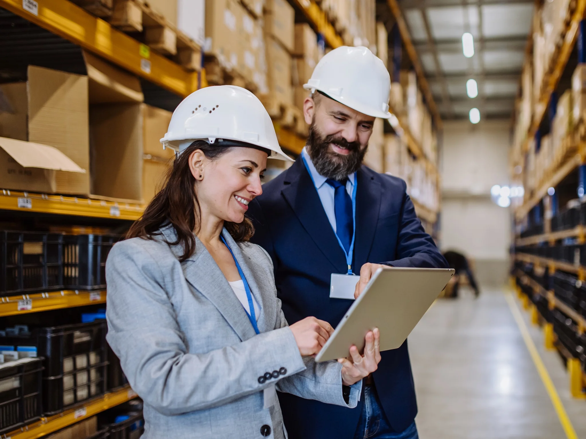 Head of logistics reviewing a tablet
