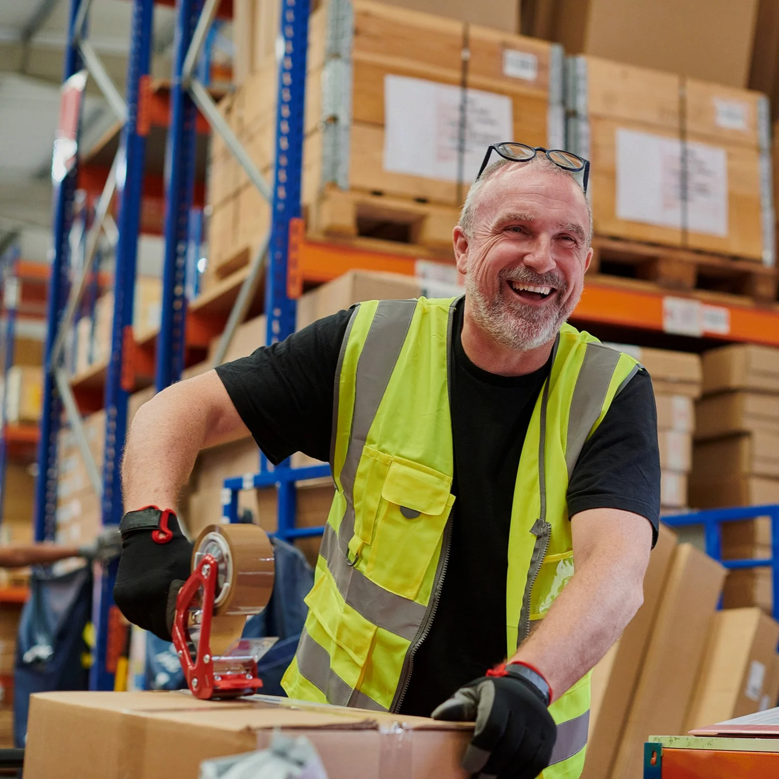 XPO image Smiling warehouse worker