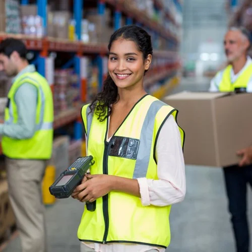 Industry Insights preview image A Warehouse Operative wearing a yellow hi vis vest whilst stood in a warehouse