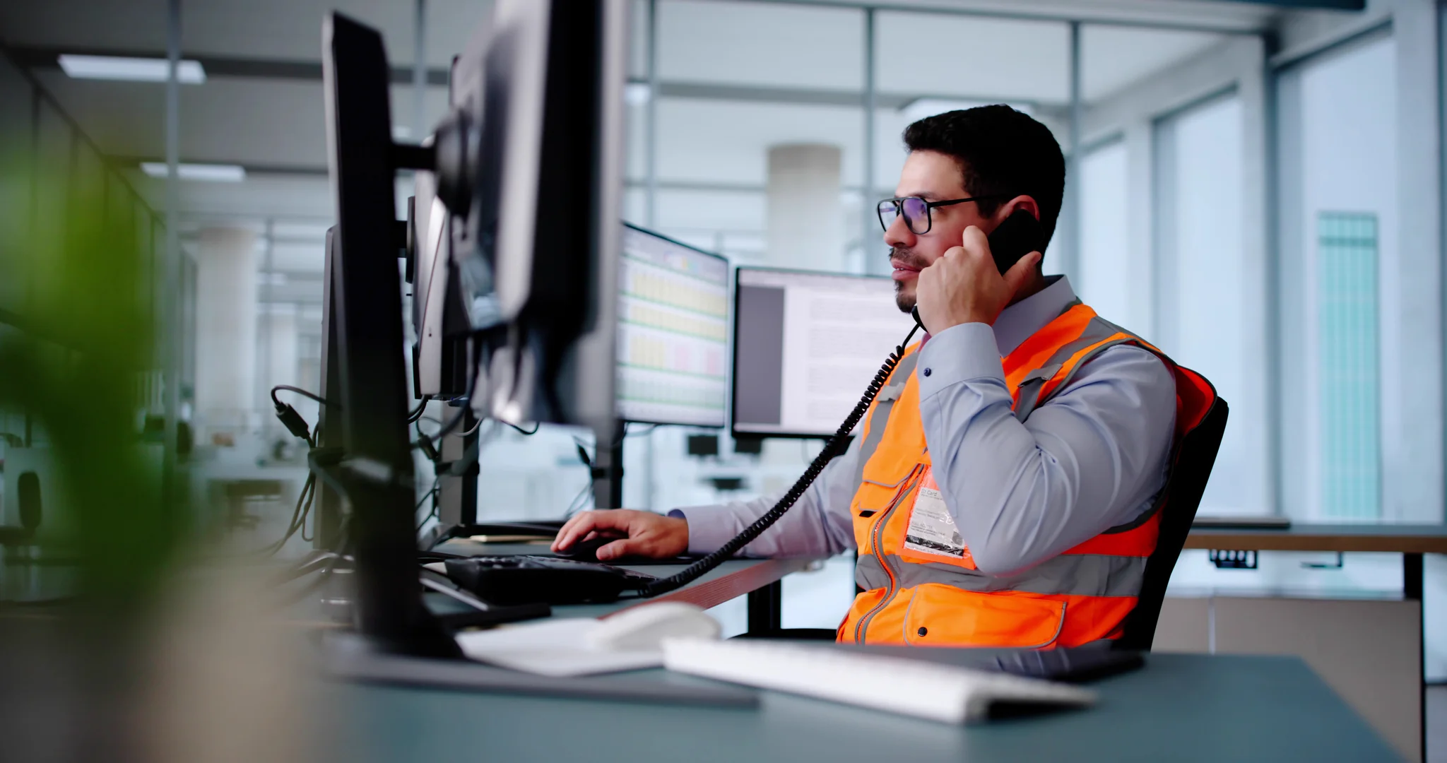 Transport Coordinator at desk