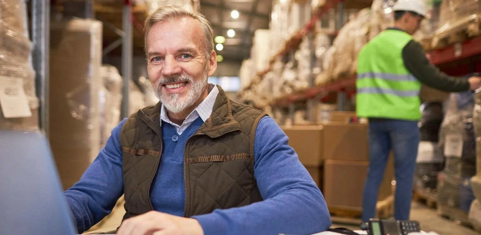 Transport & Logistics image man in warehouse smiling