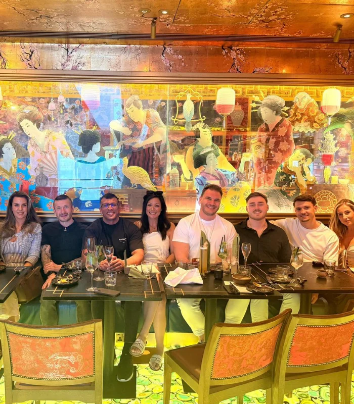 Group of men and women celebrating promotions