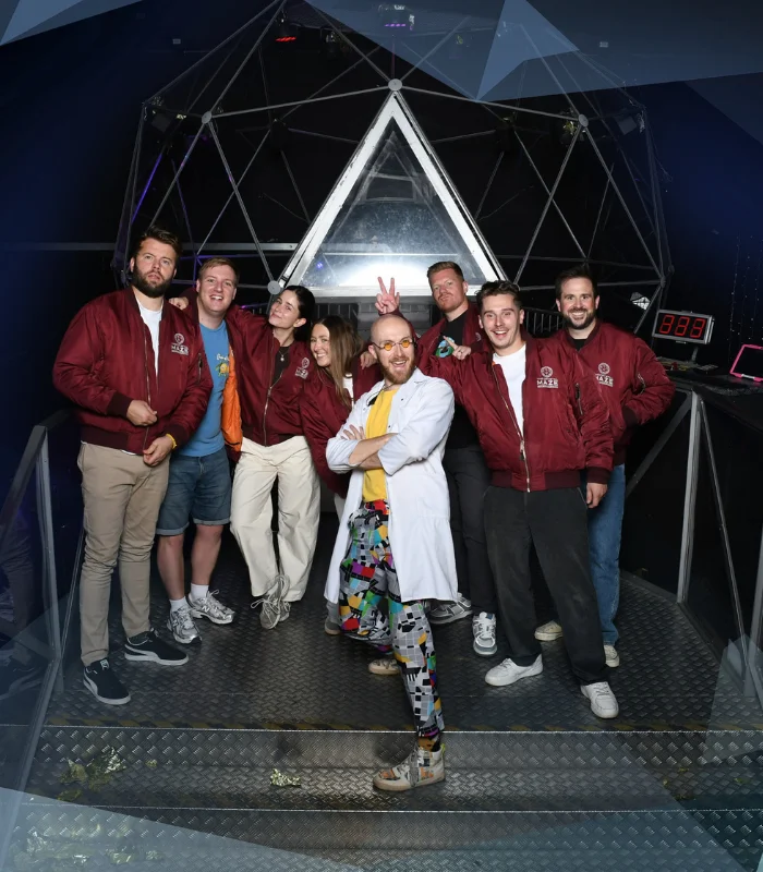 Group of men and women finishing Crystal Maze, Manchester
