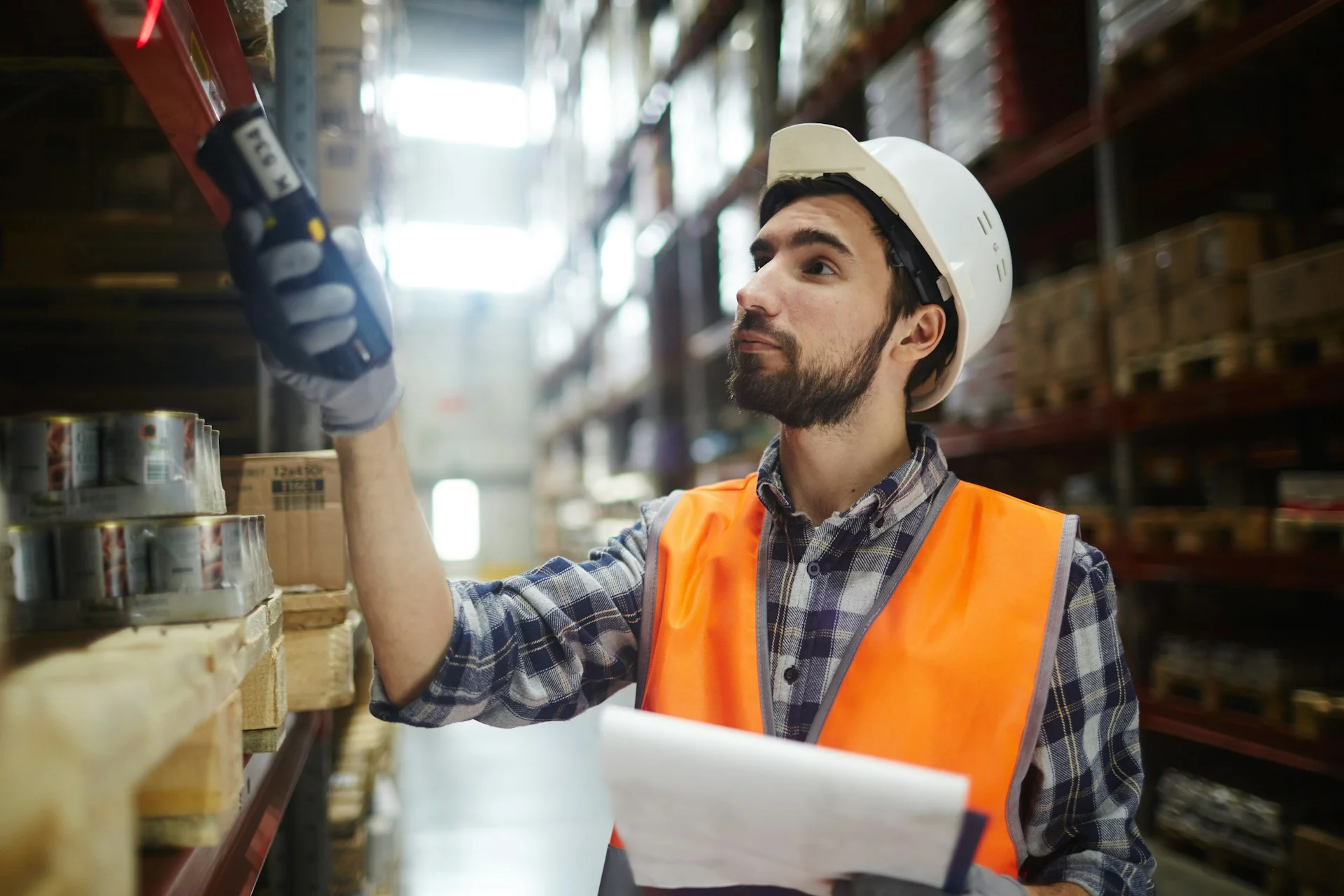 dispatcher-of-warehouse-scanning-packed-goods-