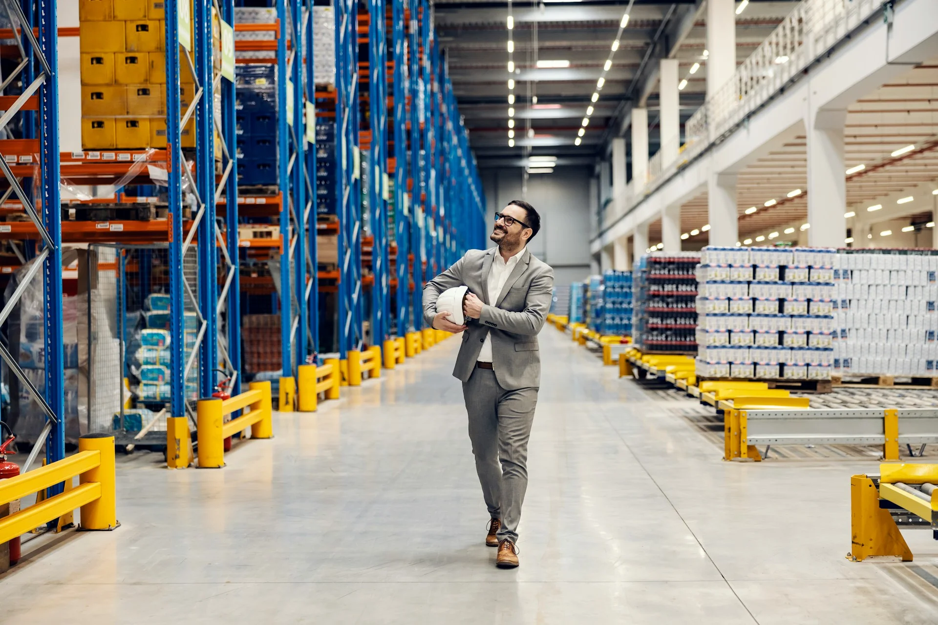 Man-walking-though-warehouse