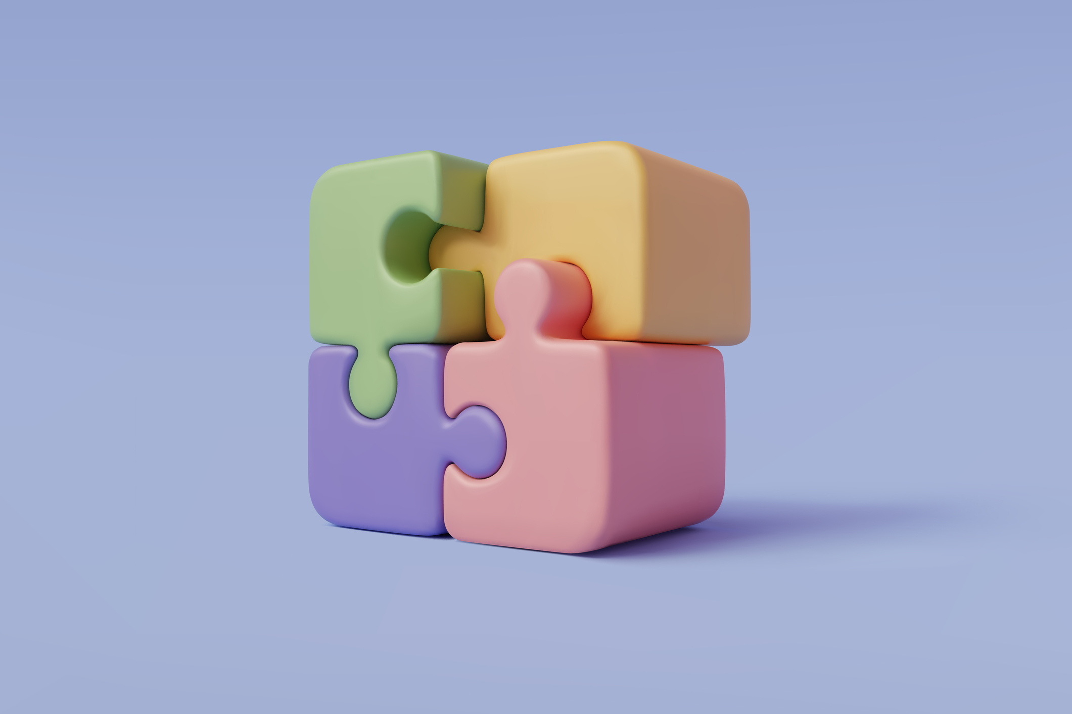 An image of four jigsaw pieces all linked together. This symbolises a challenging work environment.