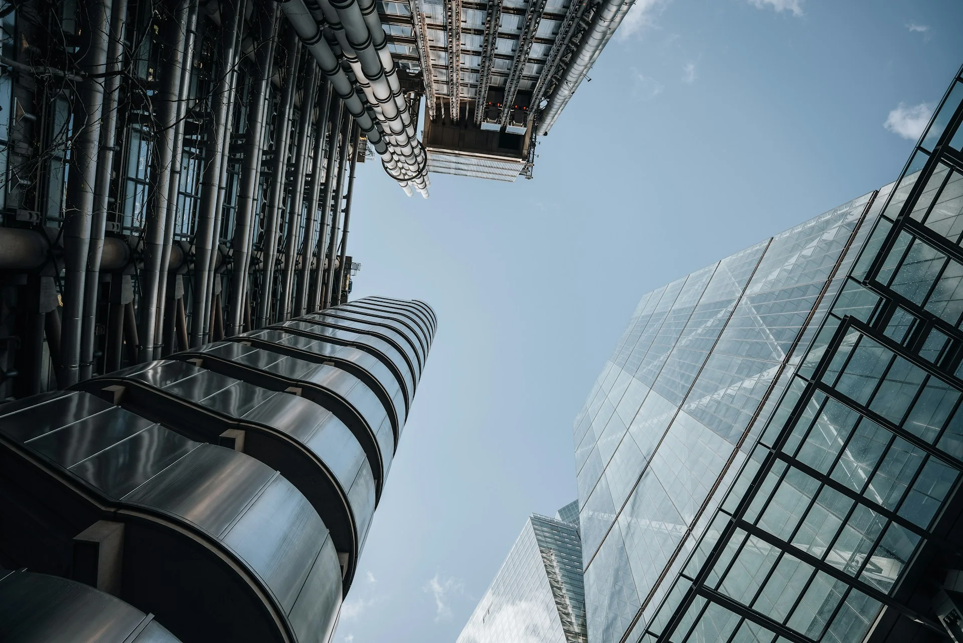 looking-up-at-two-tall-buildings-in-a-city-