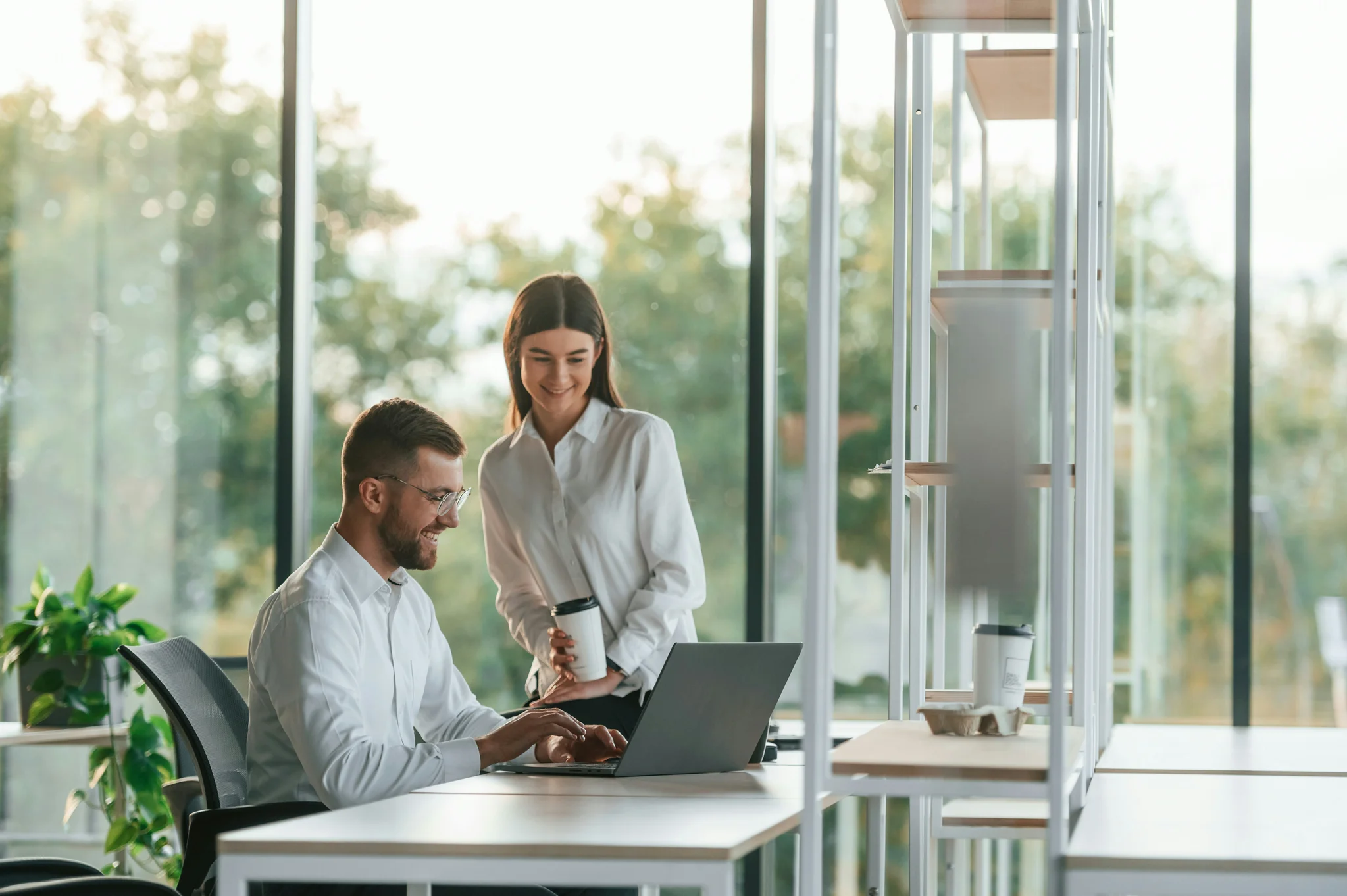 sharing-ideas-man-and-woman-are-working-in-the-modern-office-together-
