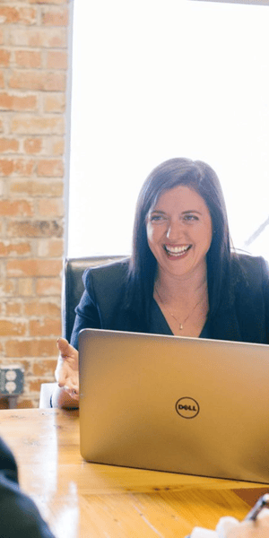 Integro Partners consultant working with laptop