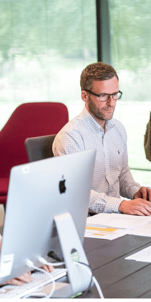 Integro Partners consultant working in the office