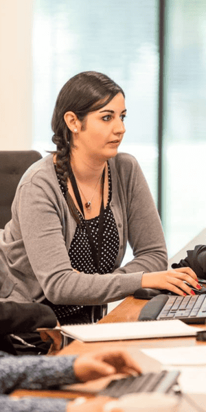 Integro Partners consultant using keyboard