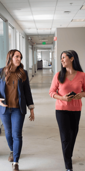Integro Partners two team members walking