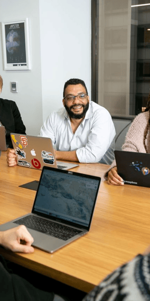 Integro Partners people working at the office