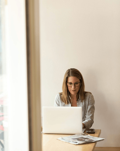 Integro Partners working from a laptop