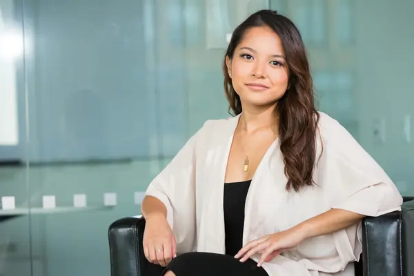 woman in modern office sitting