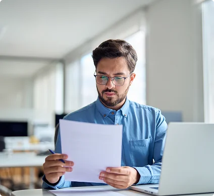 man reading document