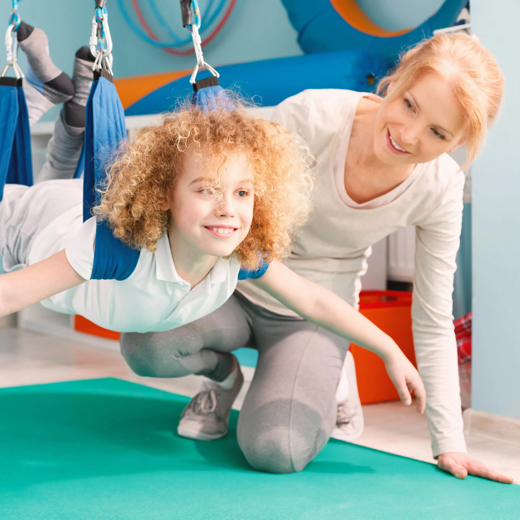 allied-health-professional-helping-a-young-child
