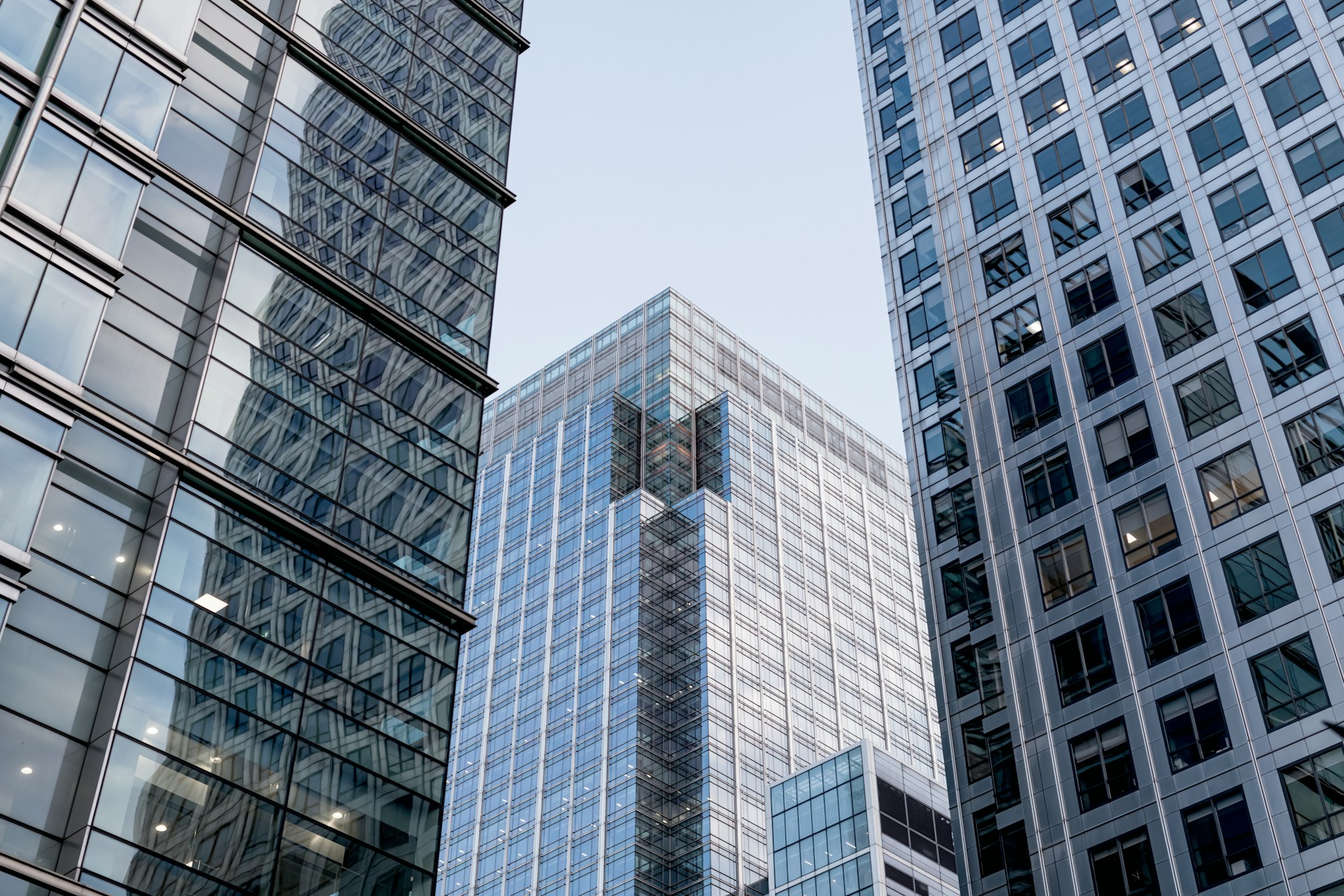 a-group-of-tall-buildings-next-to-each-other-