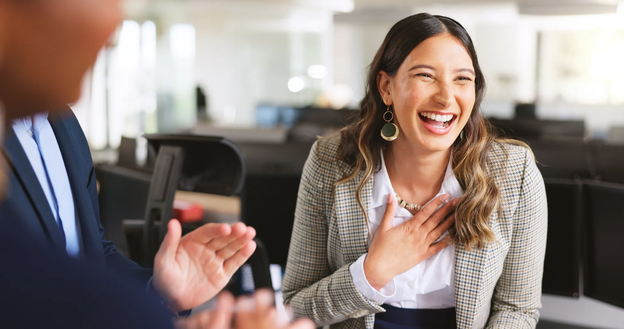 Woman Payroll Specialist Uses Laptop