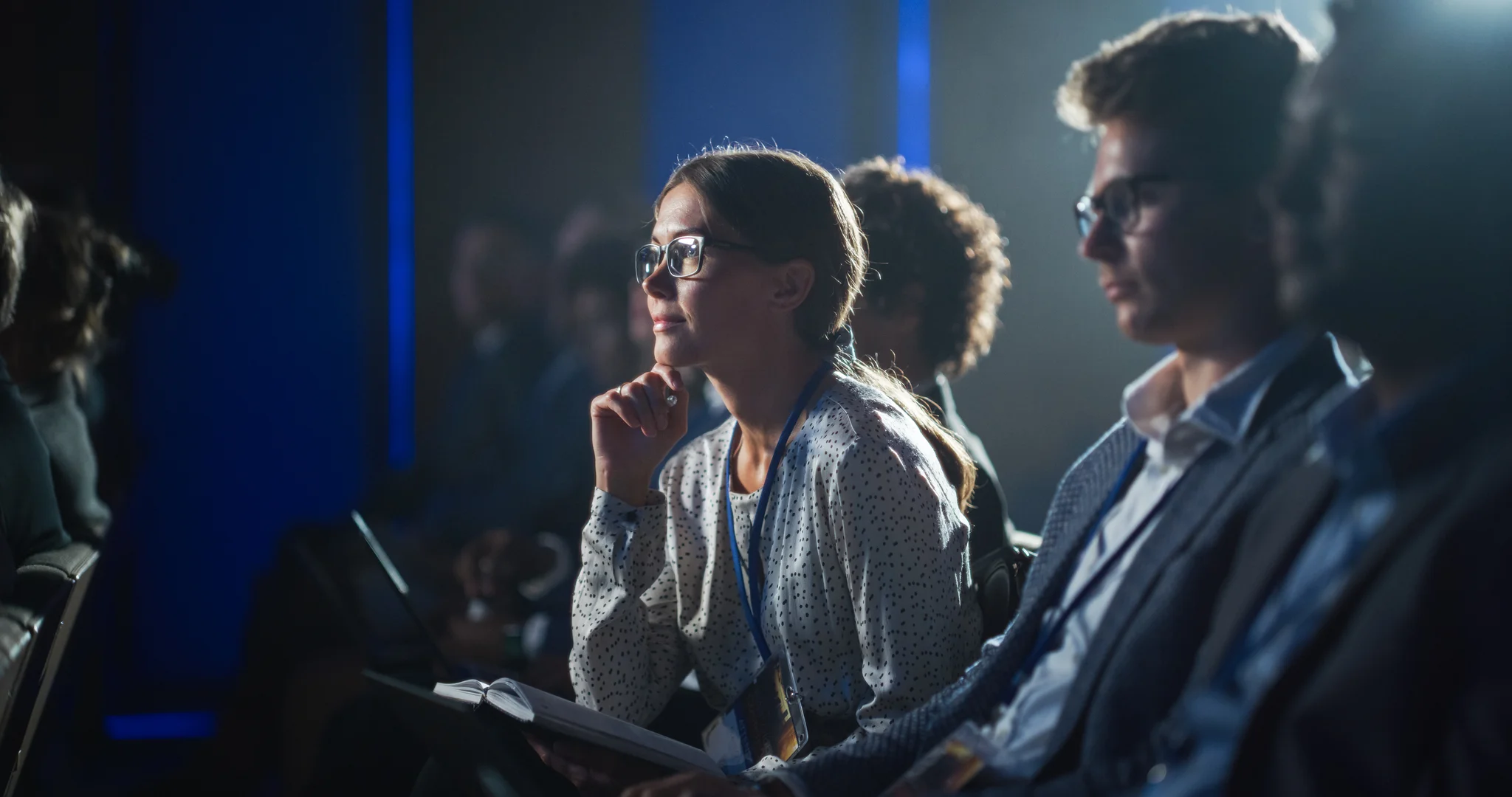 Bustling tech conference, with industry leaders, innovators, and enthusiasts gathering to discuss the latest trends and breakthroughs in technology
