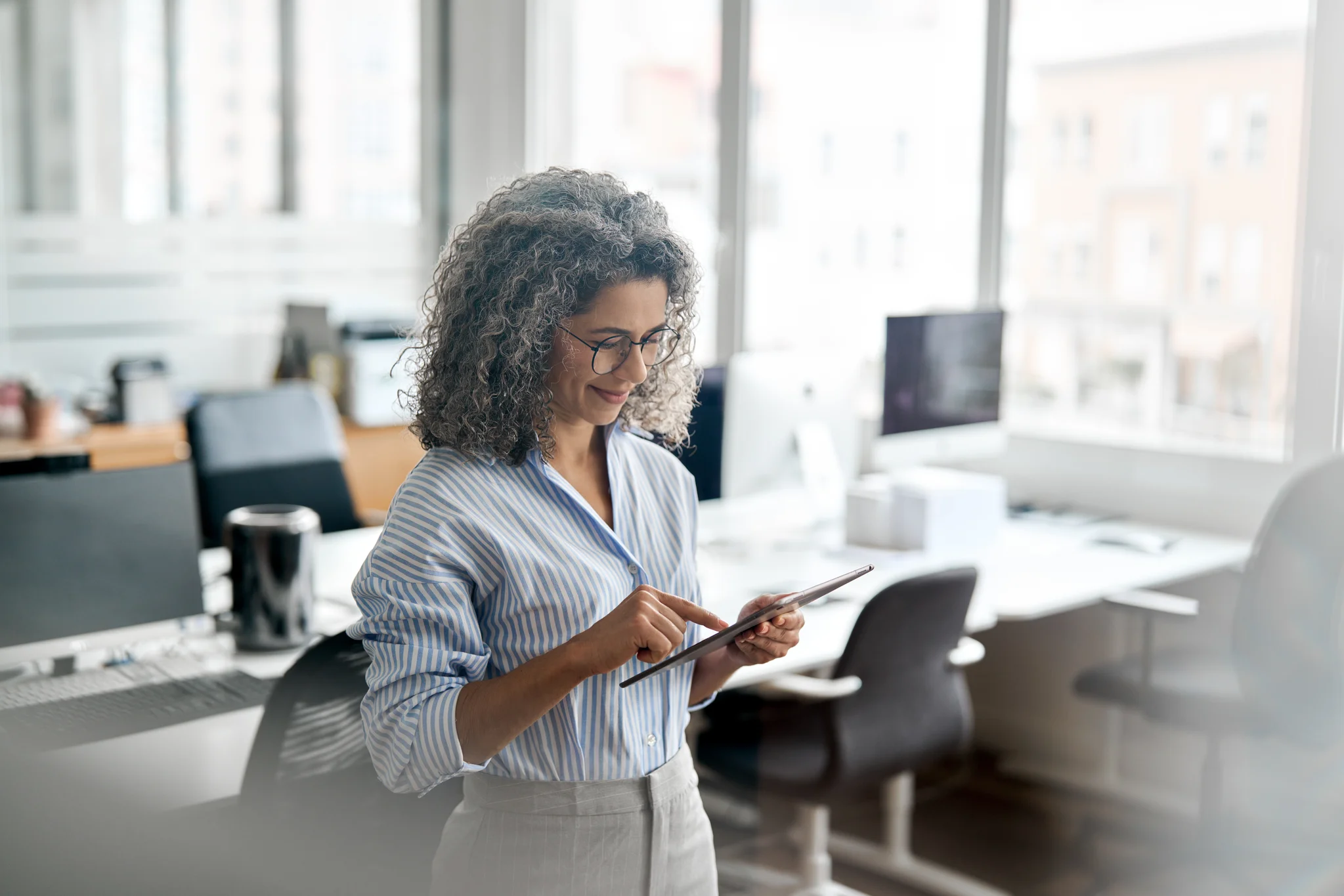 professional business woman using tab computer in office. 