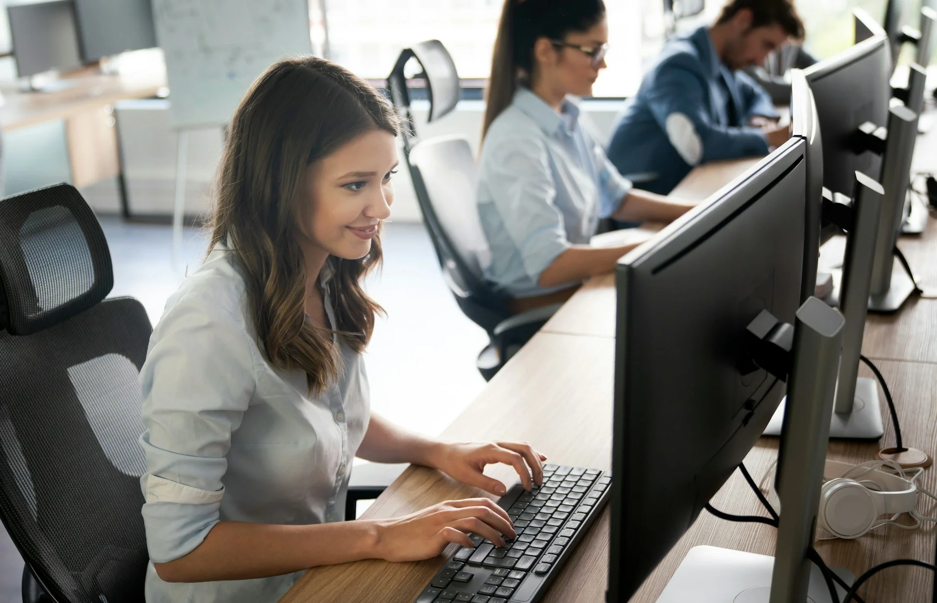 woman typing on computer