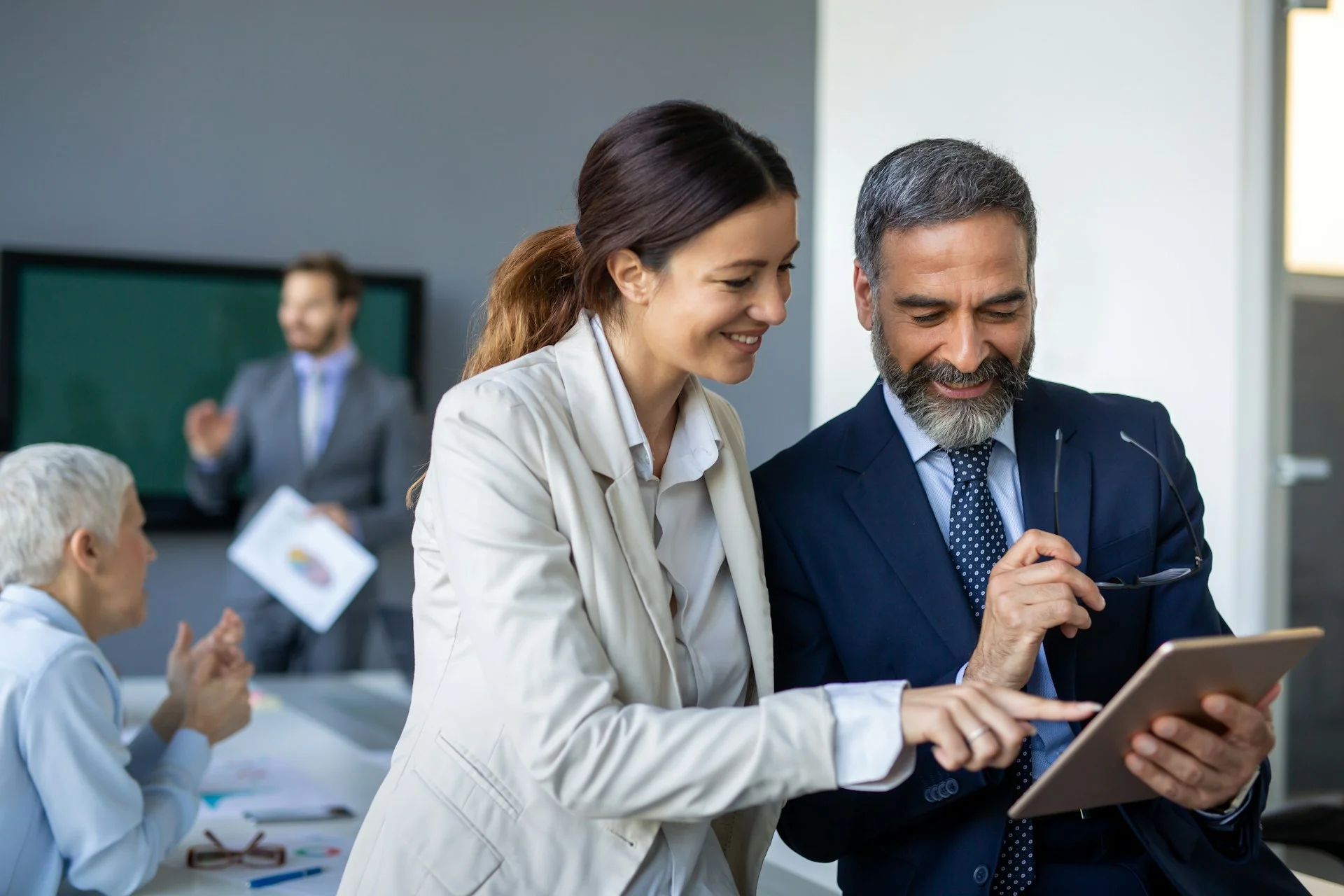 two buisness people working and talking