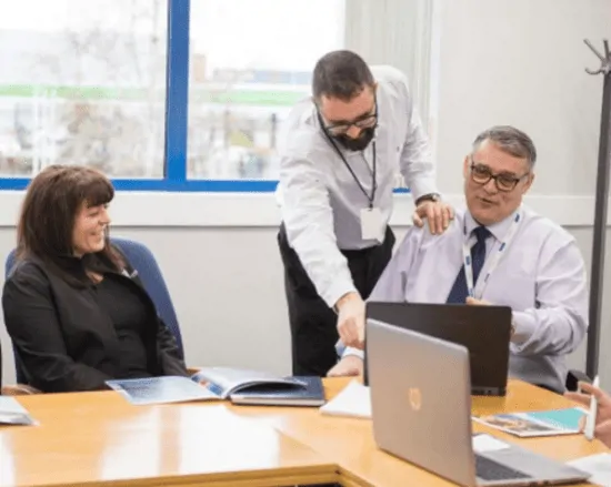 Office professionals having a discussion in a meeting