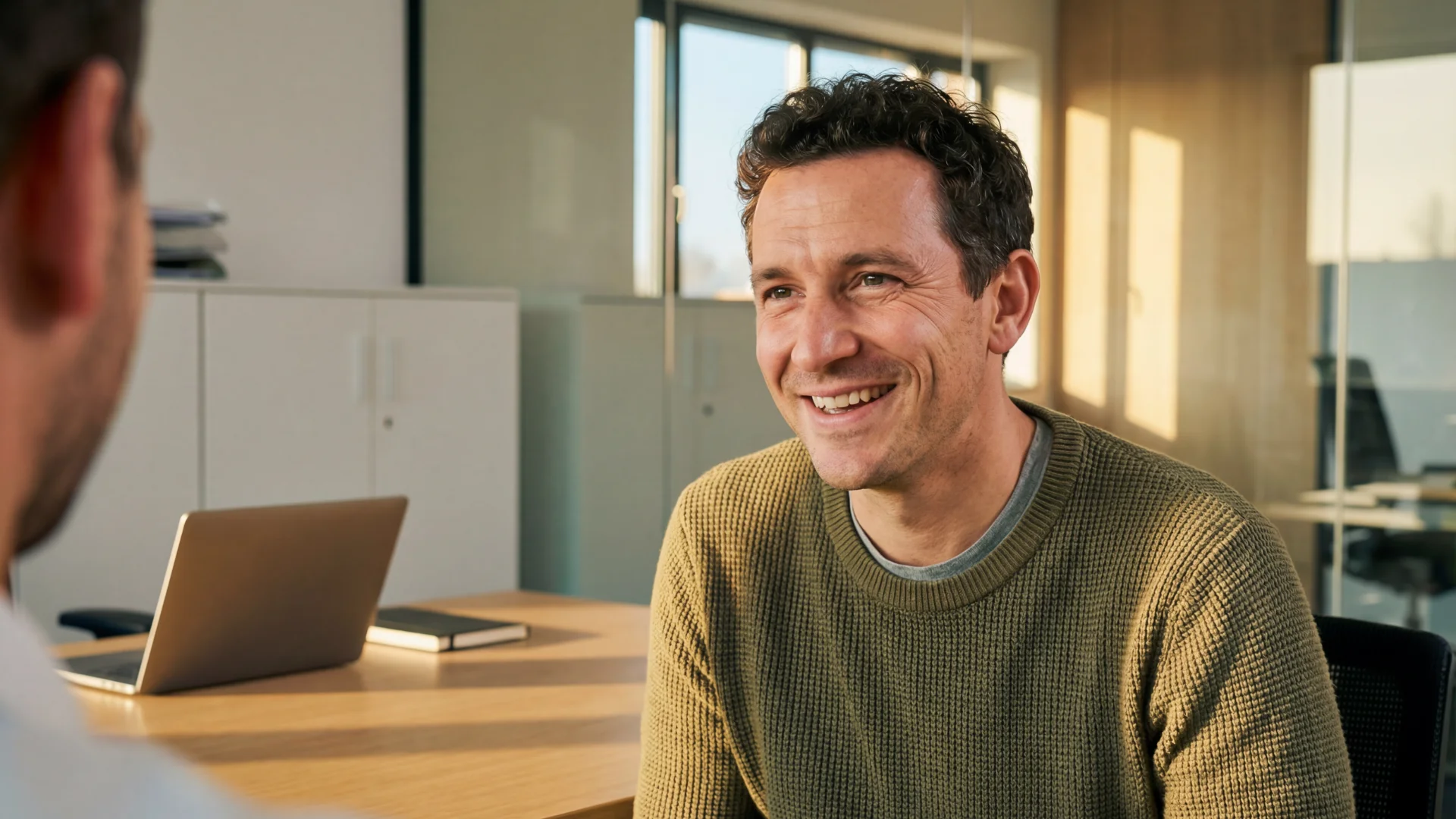 Man Smiling During Business meeting discussion