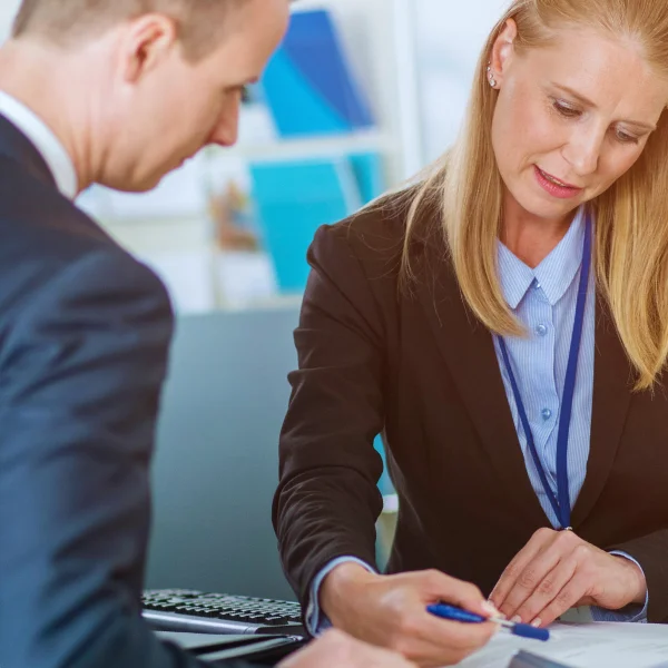 Retail banker explaining loan terms to a customer