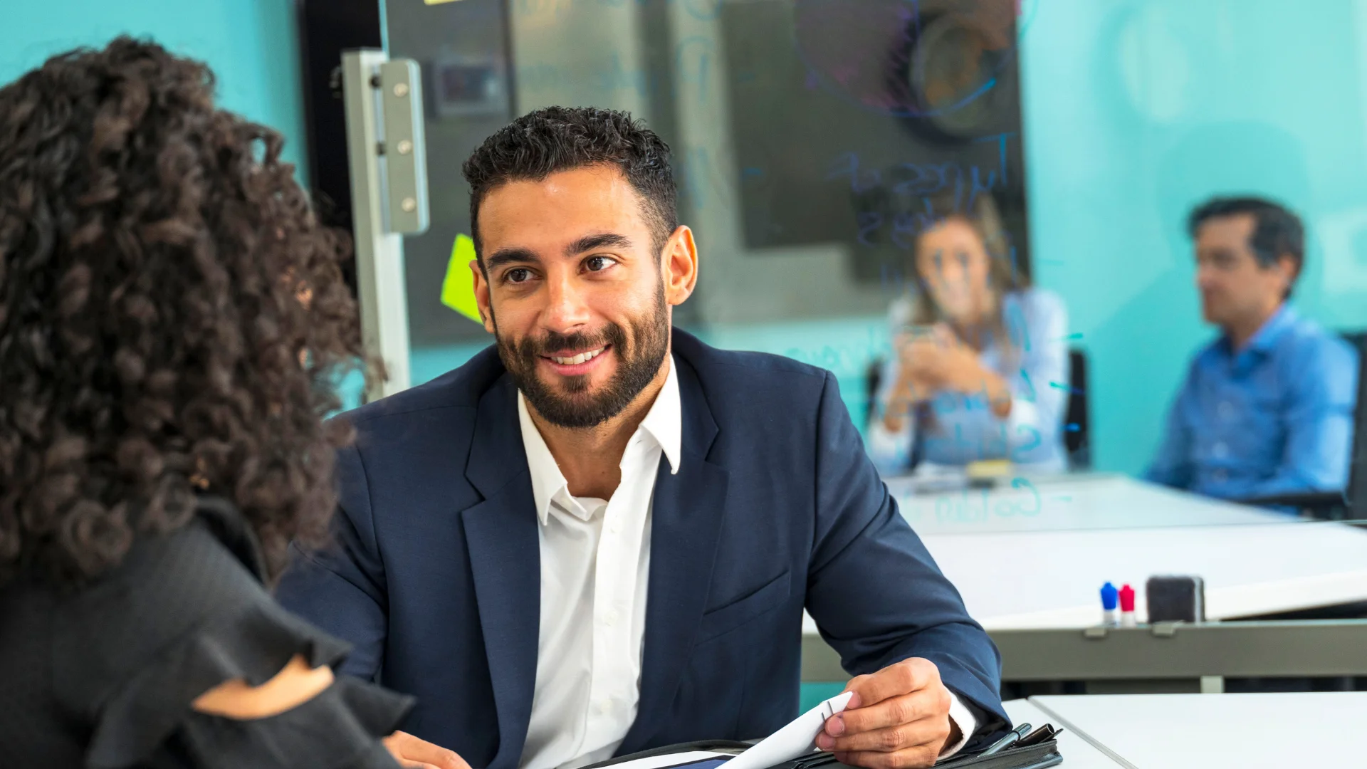 Bank branch manager meeting with an employee